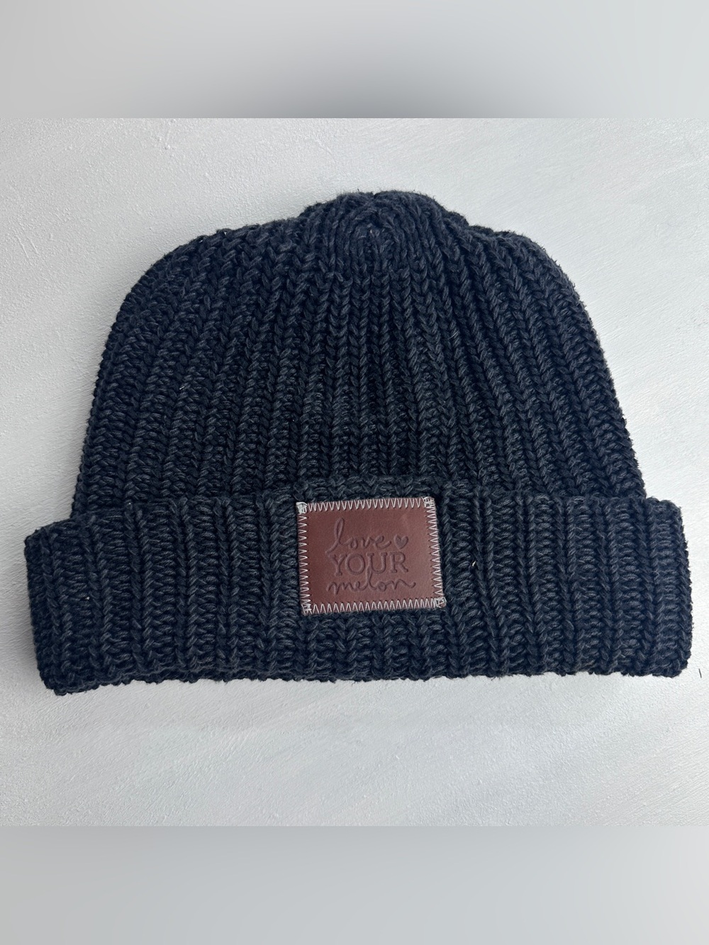 Love Your Melon Black Ribbed Knit Beanie with Leather Patch